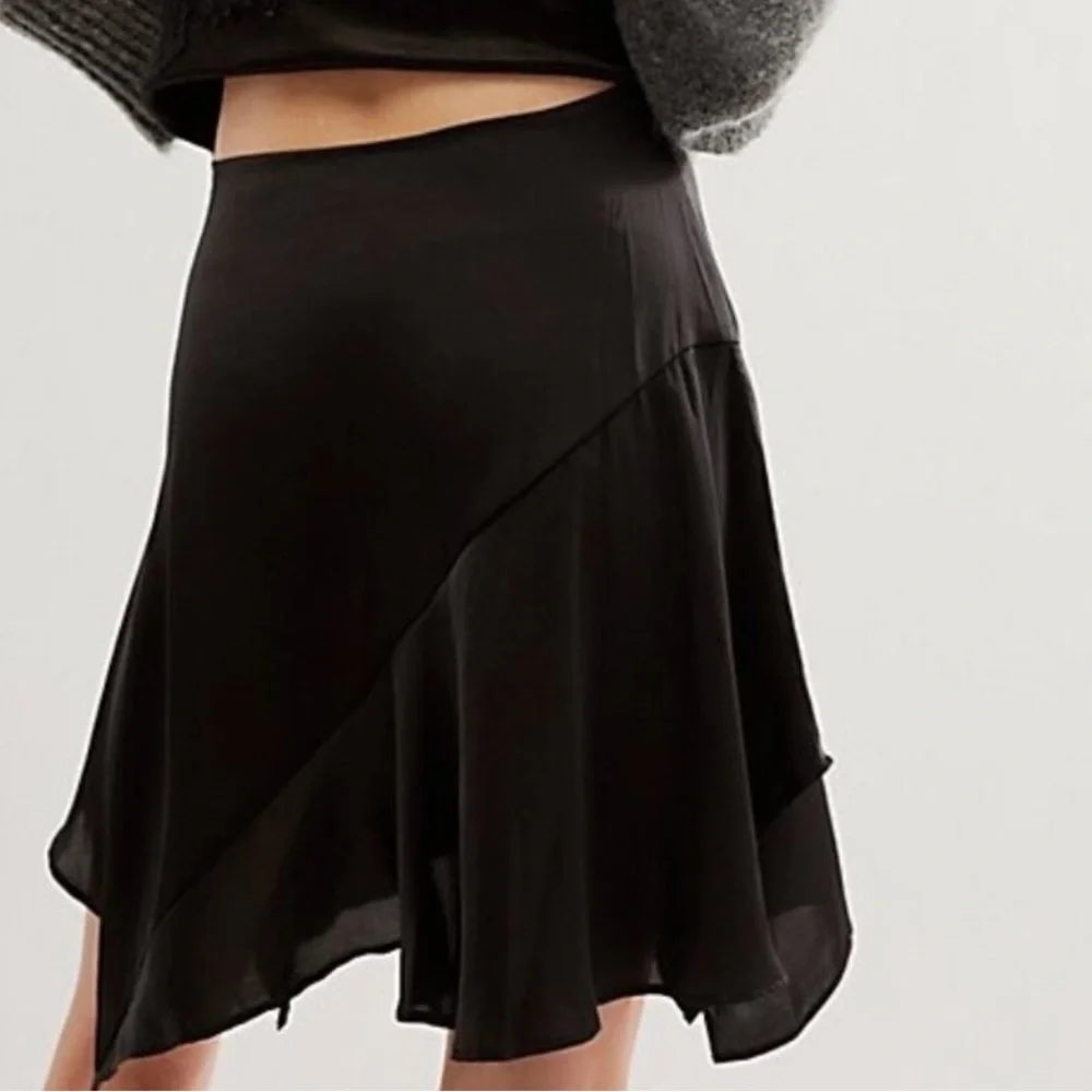 Free People size 6 Slim Shine black asymmetrical silky feel mid-rise short skirt